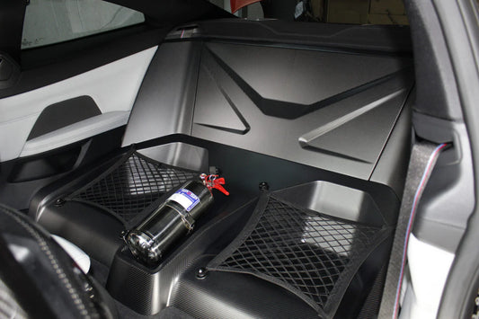 BMW G82 M4 rear seat delete close out kit. Karbonius carbon fiber.